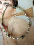 Collier aux teintes pastel, très douces , à l'esprit japonisant, réalisé avec perles de récupération, monté sur câble recouvert de bunacord