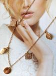 Collier breloques réalisé à base de récupération diverse