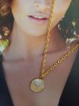 Collier breloque réalisé à base de récupération