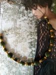 Collier réalisé avec perles de récupération, monté sur câble