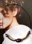 Collier réalisé avec perles de récupération, monté sur câble