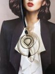 Collier-sautoir réalisé avec des éléments de récupération, monté sur lacet cuir ,réglable en longueur par perle coulissante