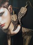 Boucles d'oreilles réalisées avec cuir et éléments de récupération, pour oreilles percées