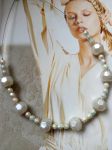 Collier réalisé avec perles de récupération, monté sur câble