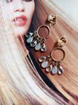 Boucles d'oreilles clips r&eacute;alis&eacute;es avec &eacute;l&eacute;ments de r&eacute;cup&eacute;ration
